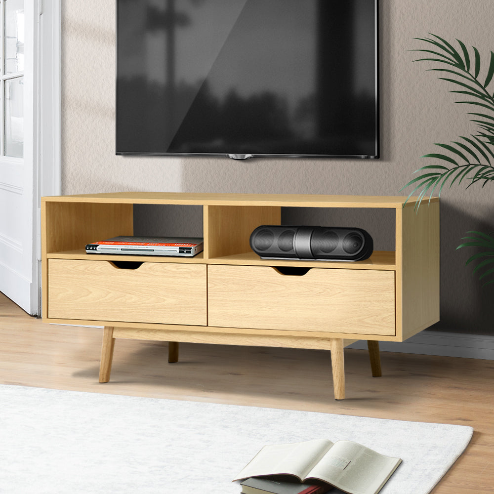 Somerset 120cm natural Scandinavian TV cabinet with tapered wood legs in a modern living room