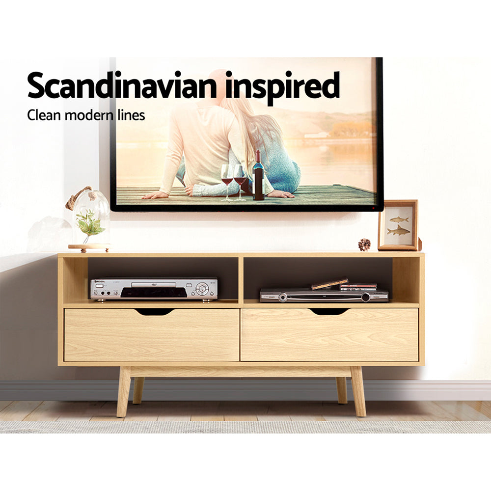 Somerset 120cm natural Scandinavian TV cabinet with tapered wood legs in a modern living room