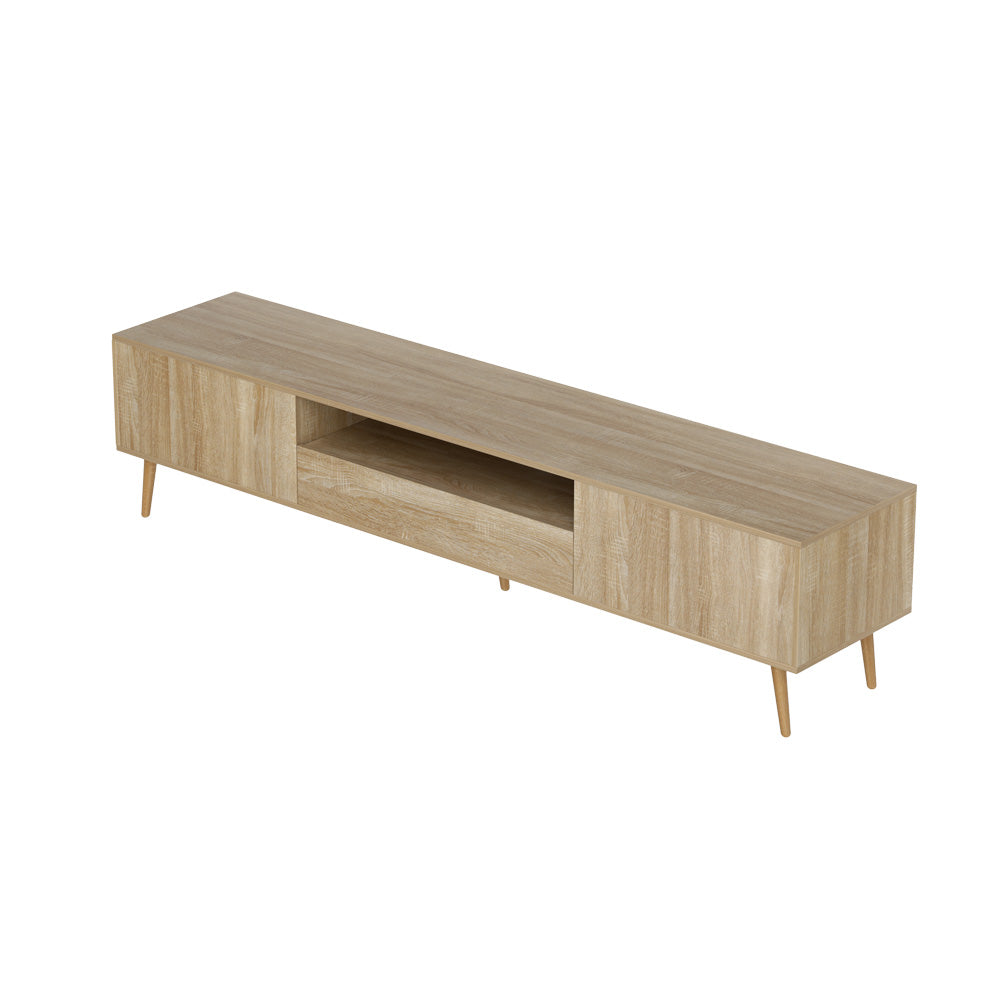 Woodbridge pine 200cm lowline entertainment unit with rubberwood legs in a modern living room