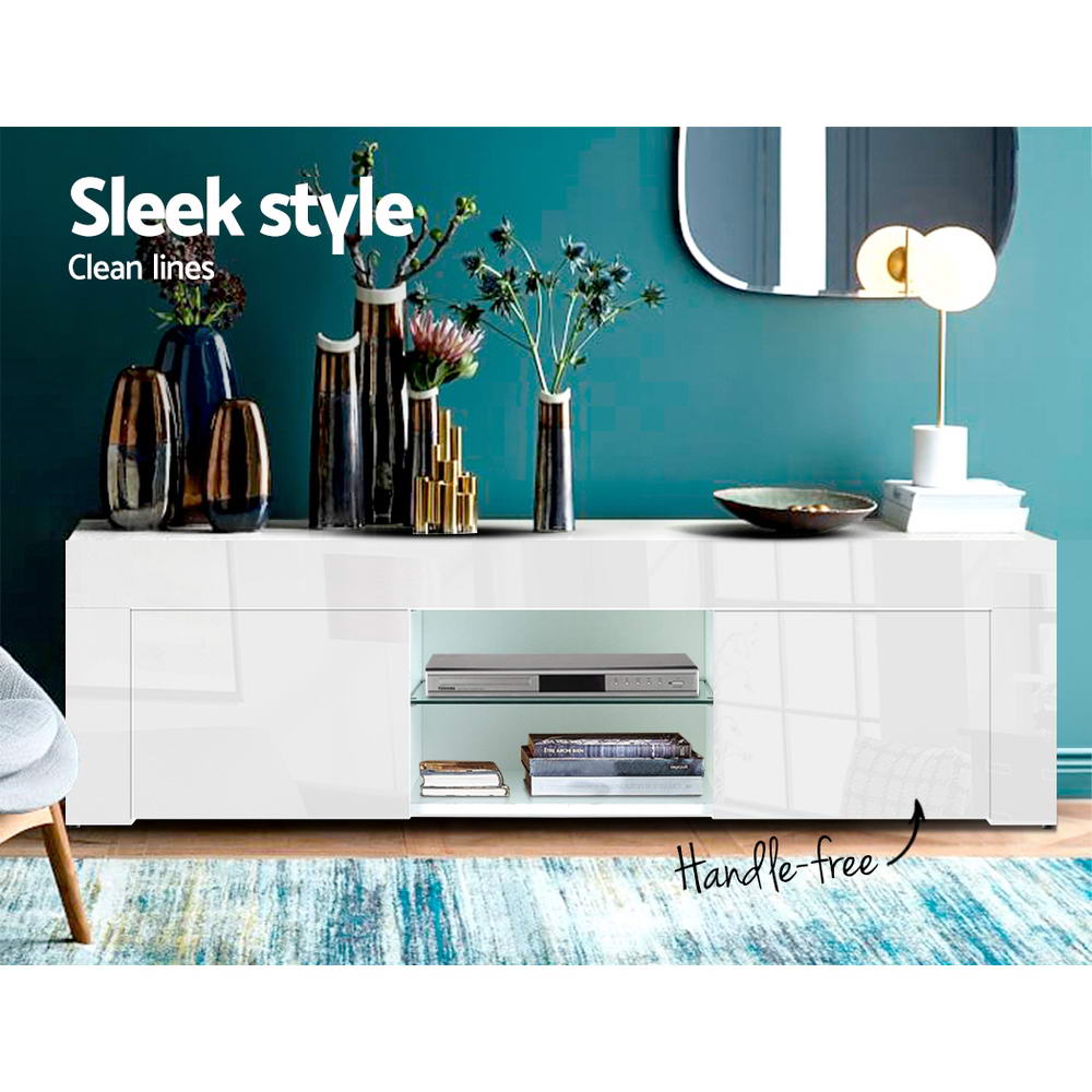 Southport white 130cm high gloss entertainment unit with glass shelves in a modern living room