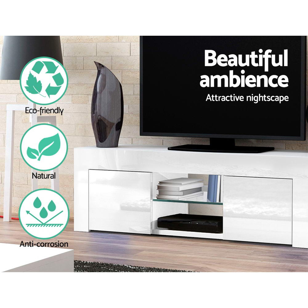 Southport white 130cm high gloss entertainment unit with glass shelves in a modern living room