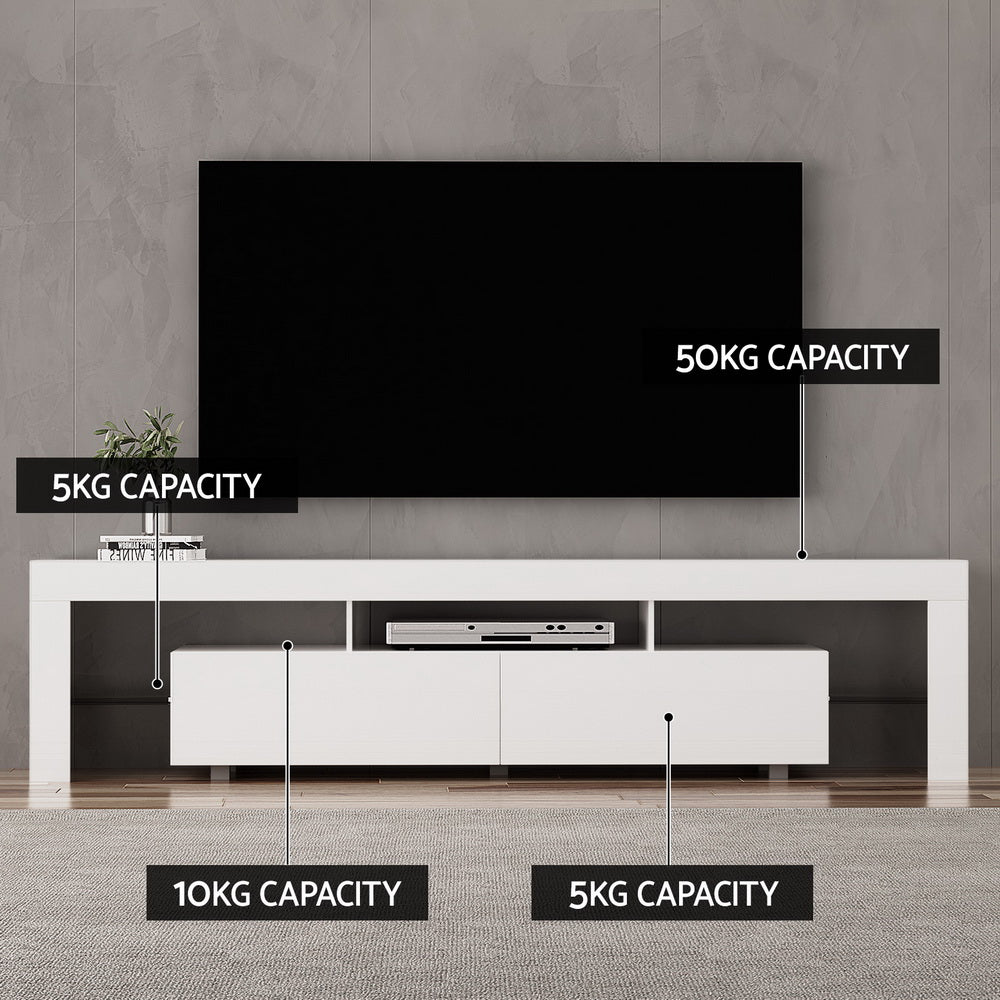 Kingston white 200cm high gloss LED entertainment unit with RGB lighting in a modern living room
