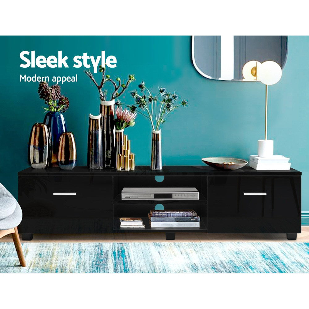 Dover black 140cm high gloss entertainment unit with two drawers in a modern living room