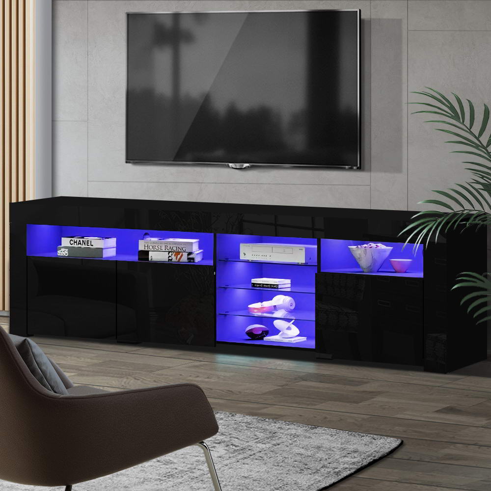 Oatlands 180cm black LED entertainment unit with colour changing lighting and glass shelves in a modern living room
