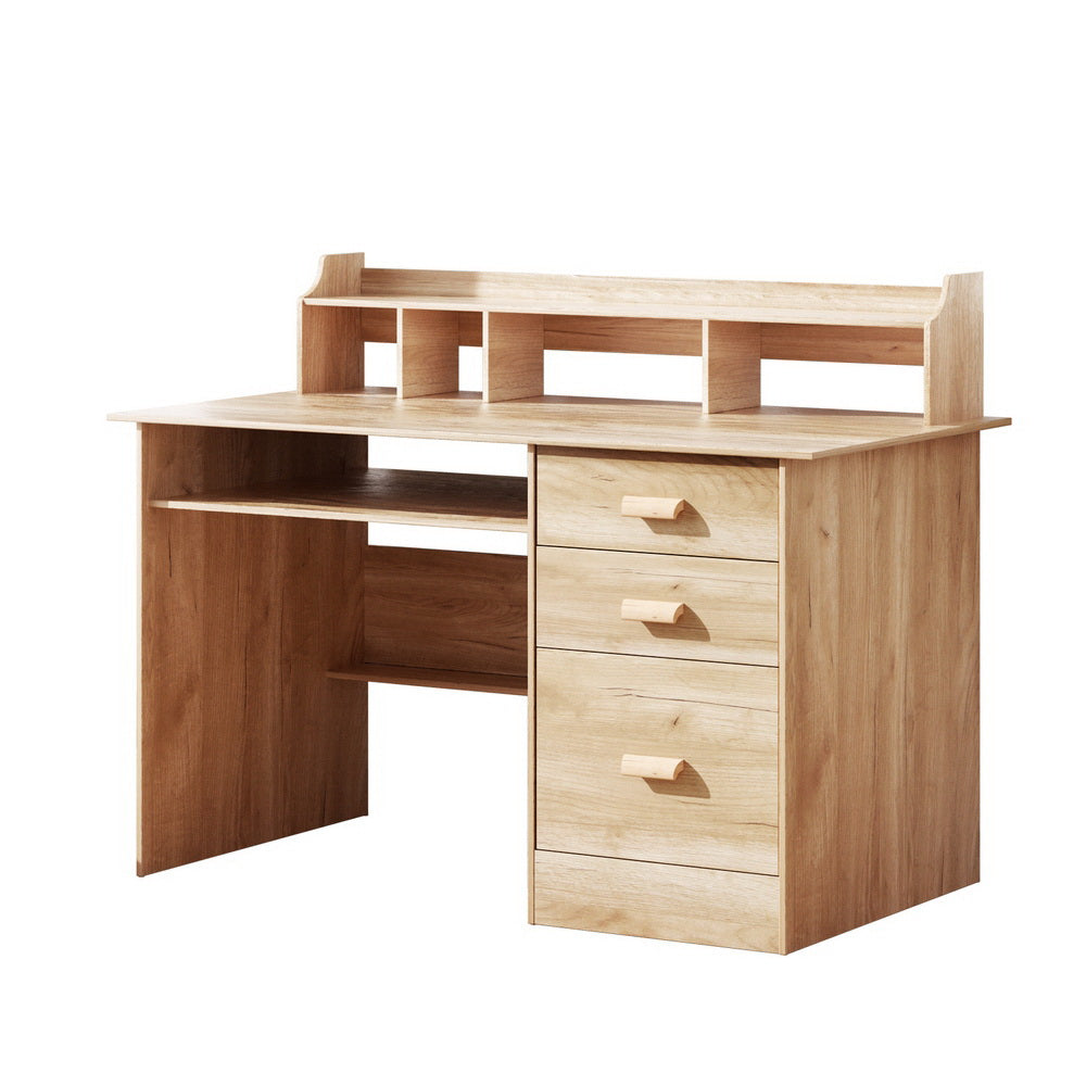 Acton pine computer desk with shelves and drawers in a home office