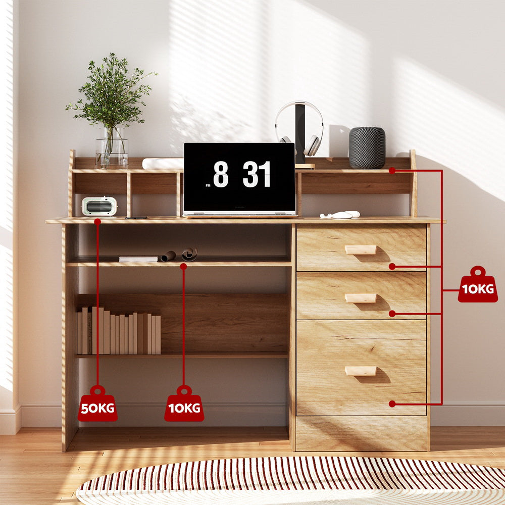 Acton pine computer desk with shelves and drawers in a home office