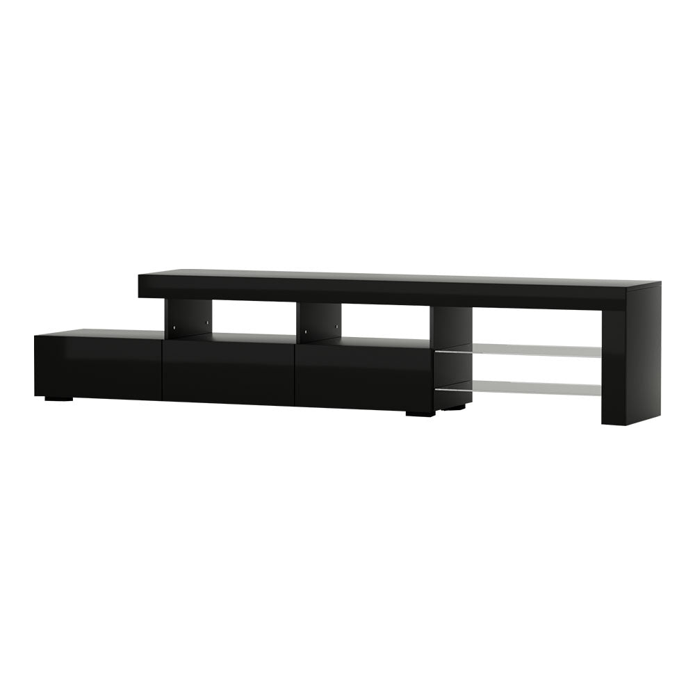 Penguin 215cm black LED entertainment unit with colour changing lighting and glass shelves in a modern living room