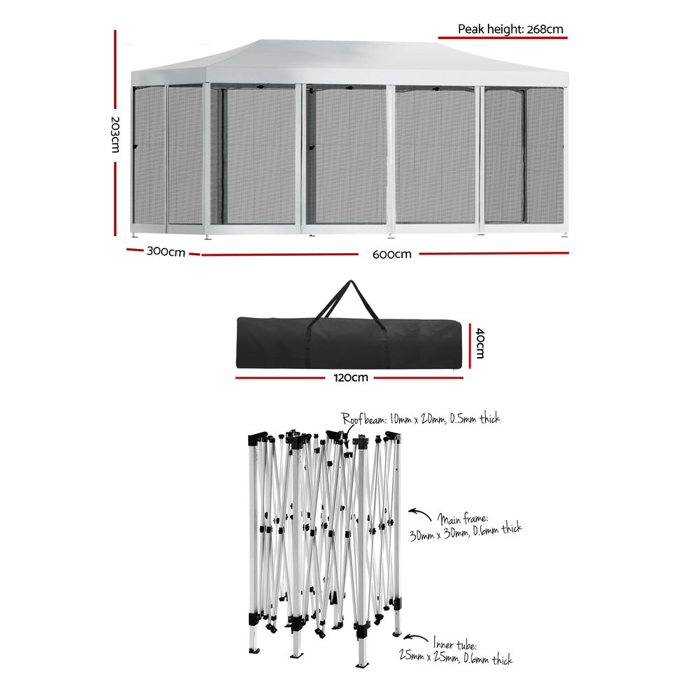 Angled view of the white pop up marquee showing the peaked canopy and steel leg frame