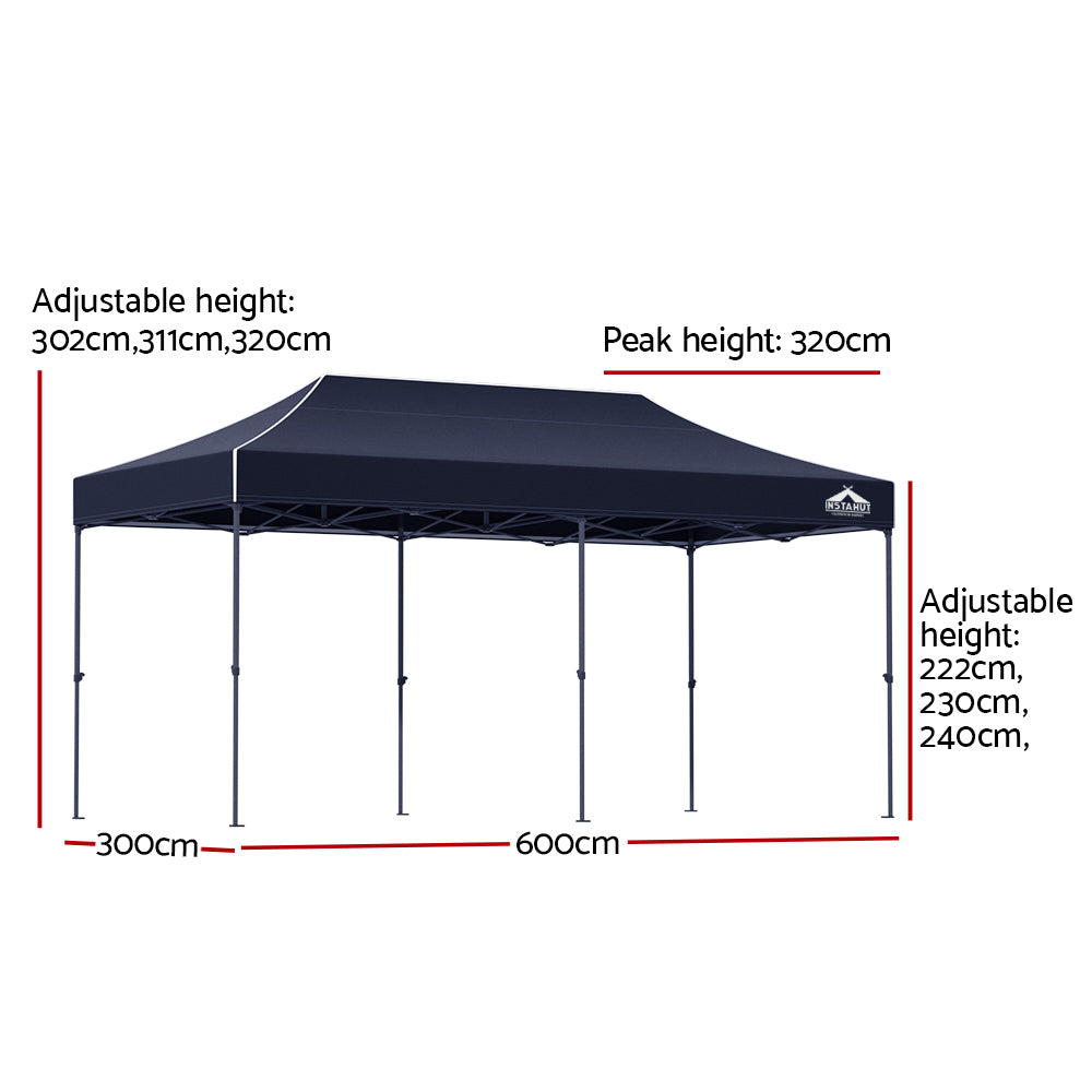 Long navy folding marquee tent shown from the side with its peaked canopy