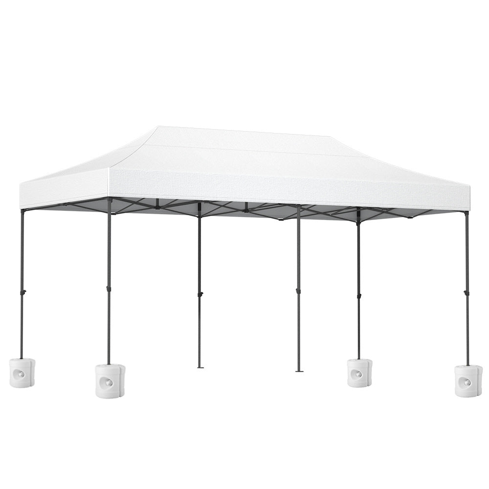 Long white folding marquee tent shown from the side with its peaked canopy