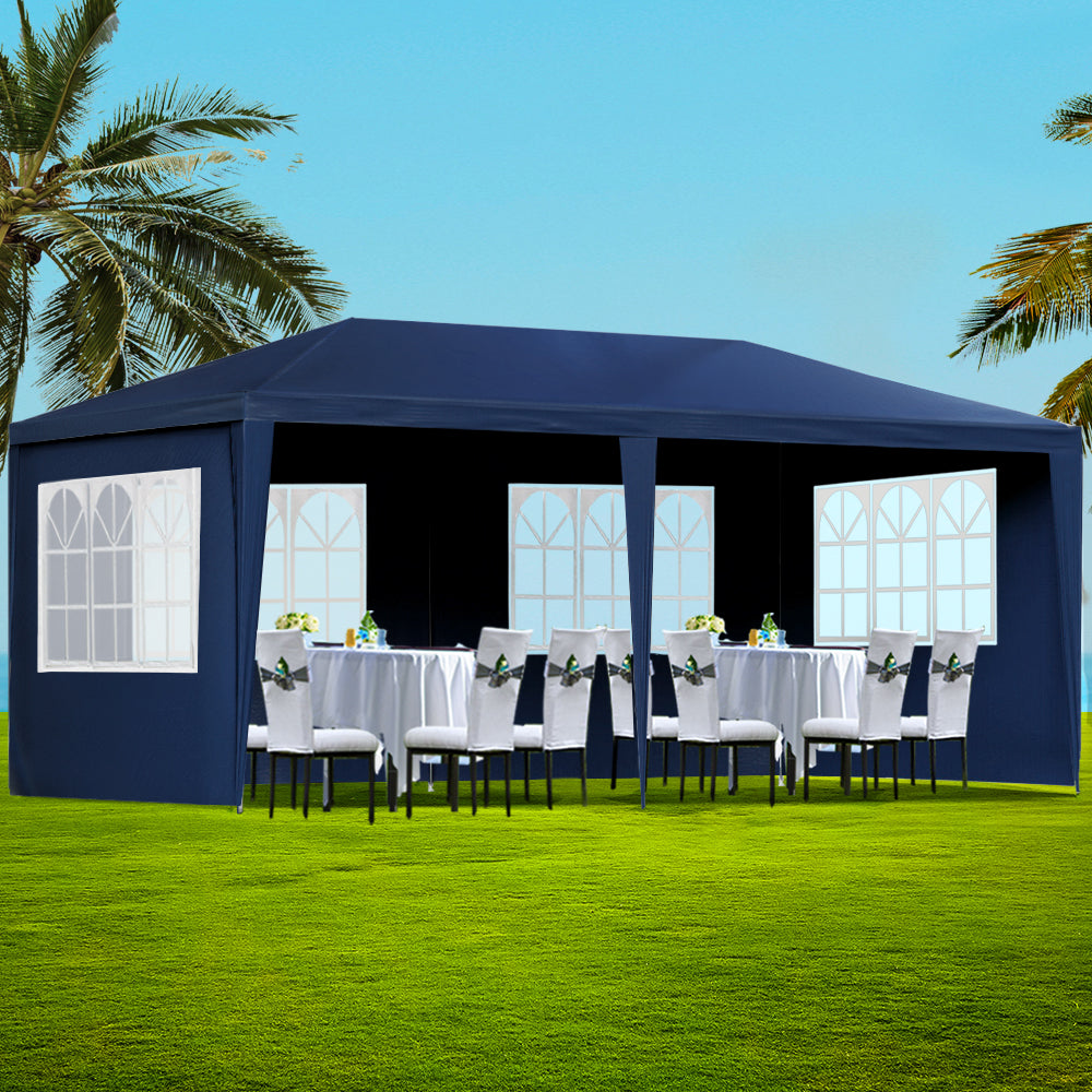 Blue 3 x 6 m marquee gazebo fully enclosed with six side panels fitted