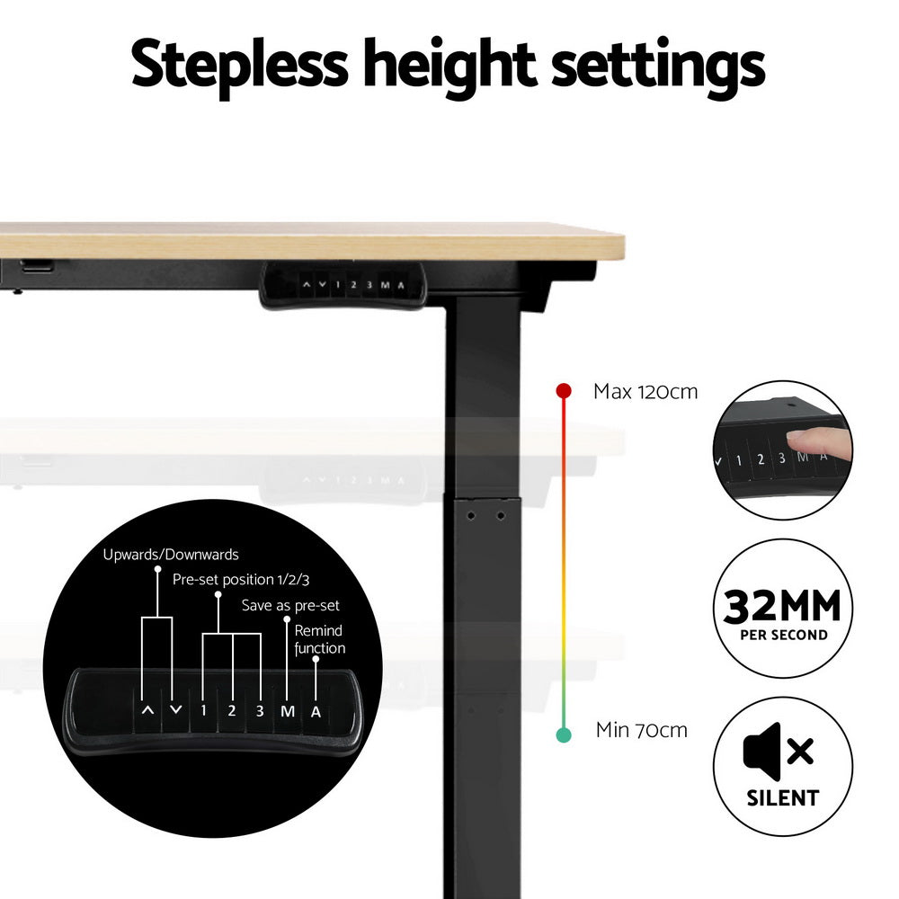 Manuka oak electric standing desk with black frame in a home office