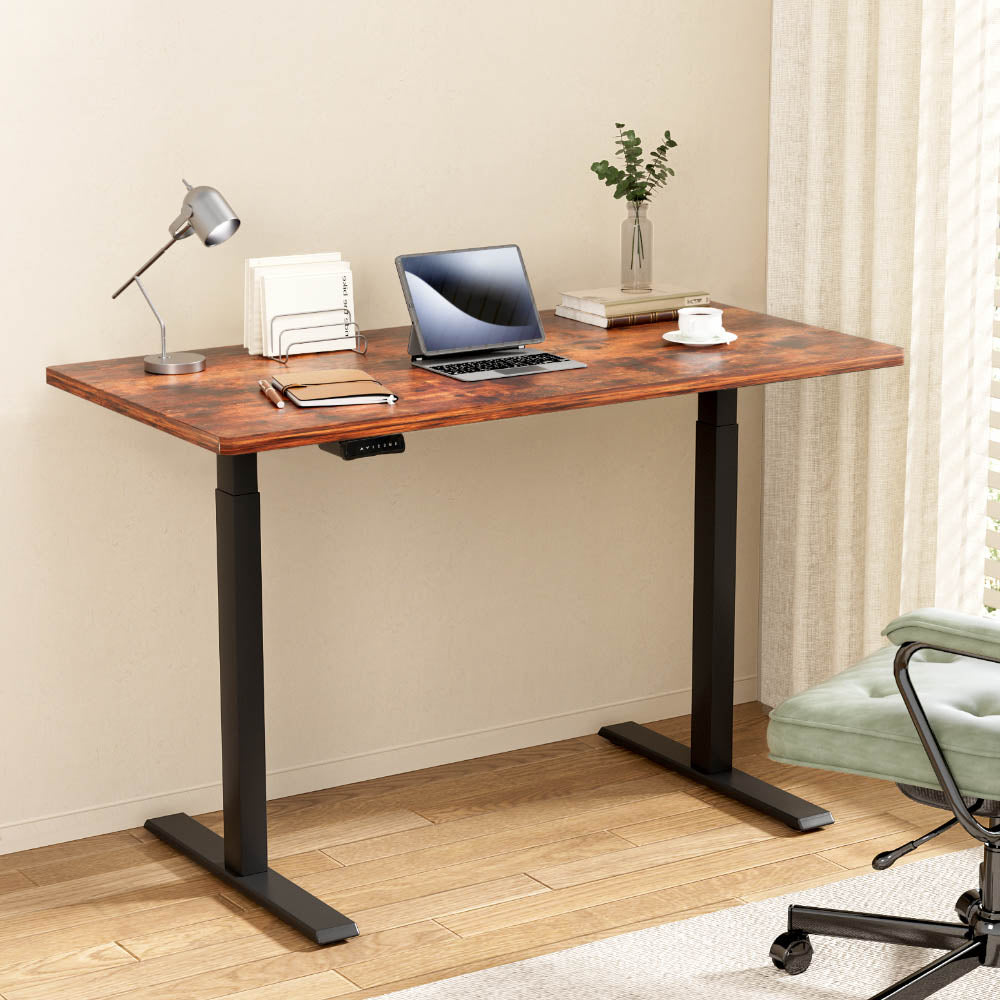 Dickson rustic brown standing desk in a home office