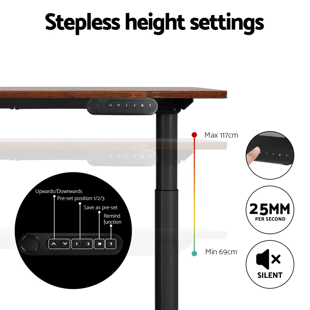 Braddon rustic brown electric standing desk with black frame in a home office