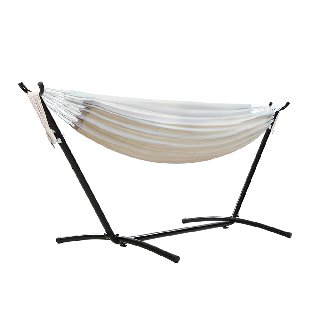 Reedy Creek cream cotton outdoor hammock in an outdoor setting