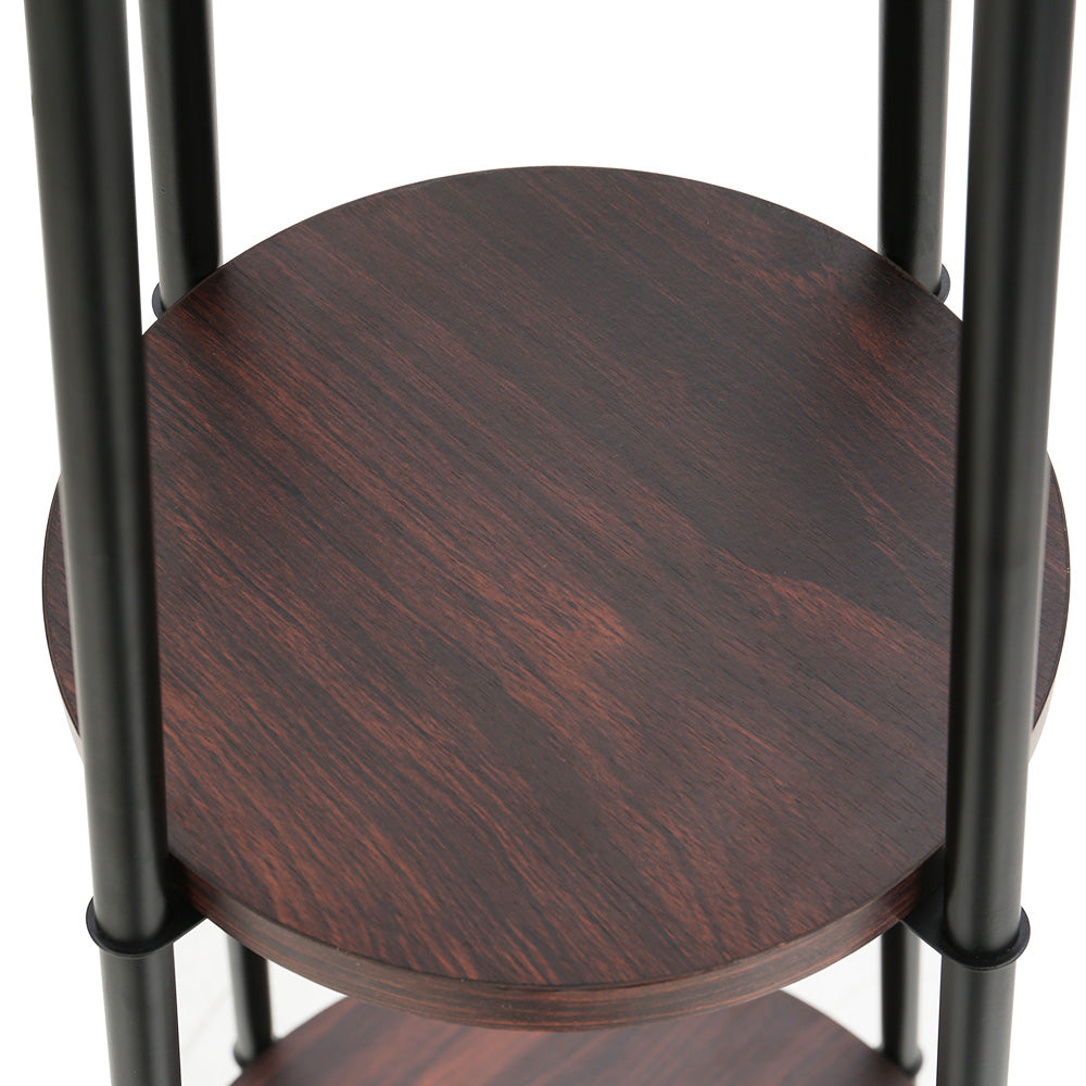 Black floor lamp with storage shelves and linen shade