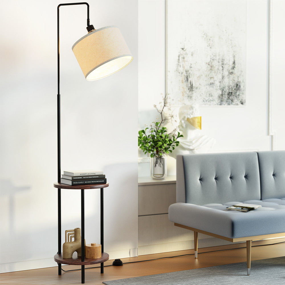 Black and walnut floor lamp with storage shelves and adjustable head