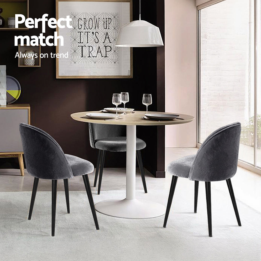 Marananga dark grey velvet dining chair in a modern dining room