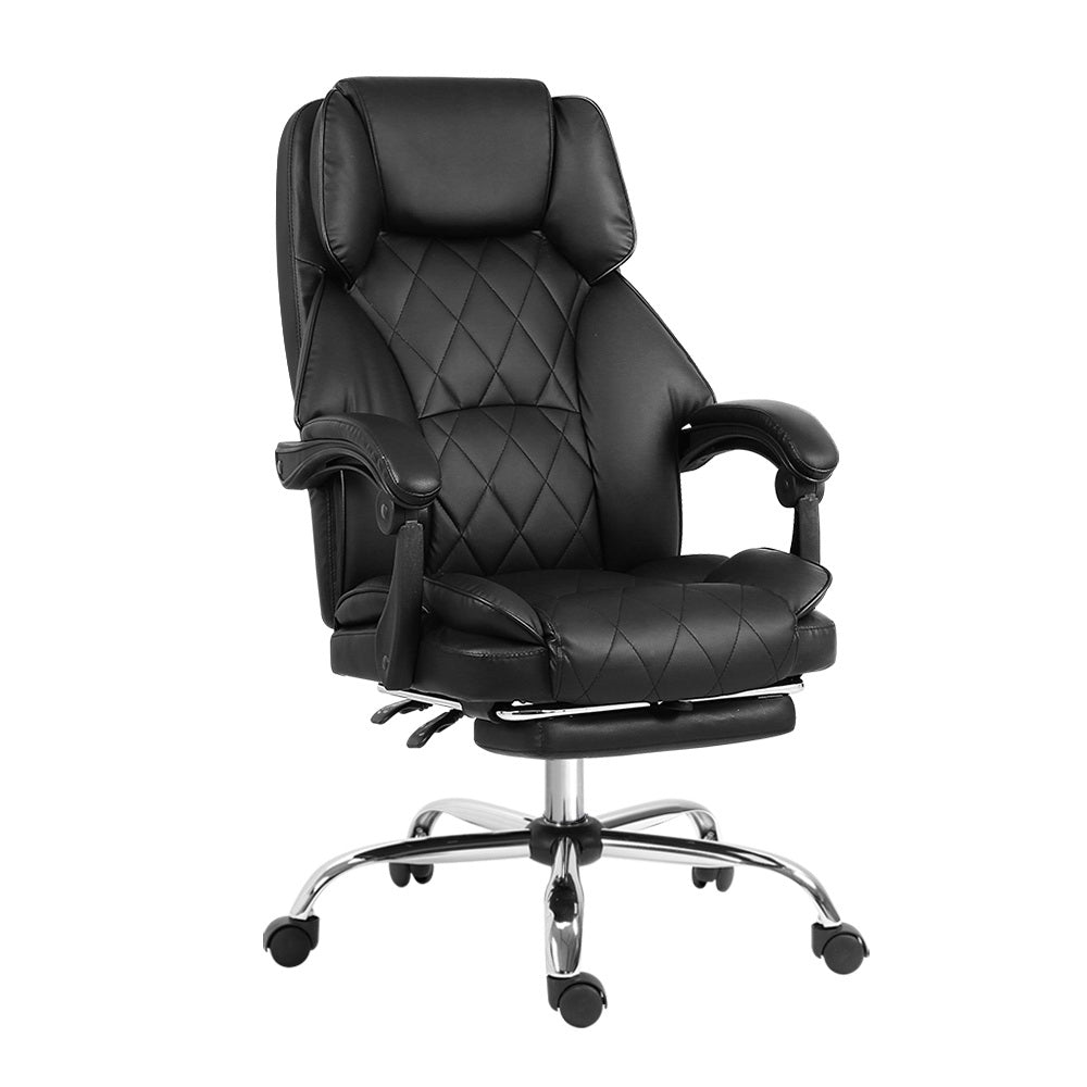 Fremantle black PU leather executive office chair with footrest in a home office
