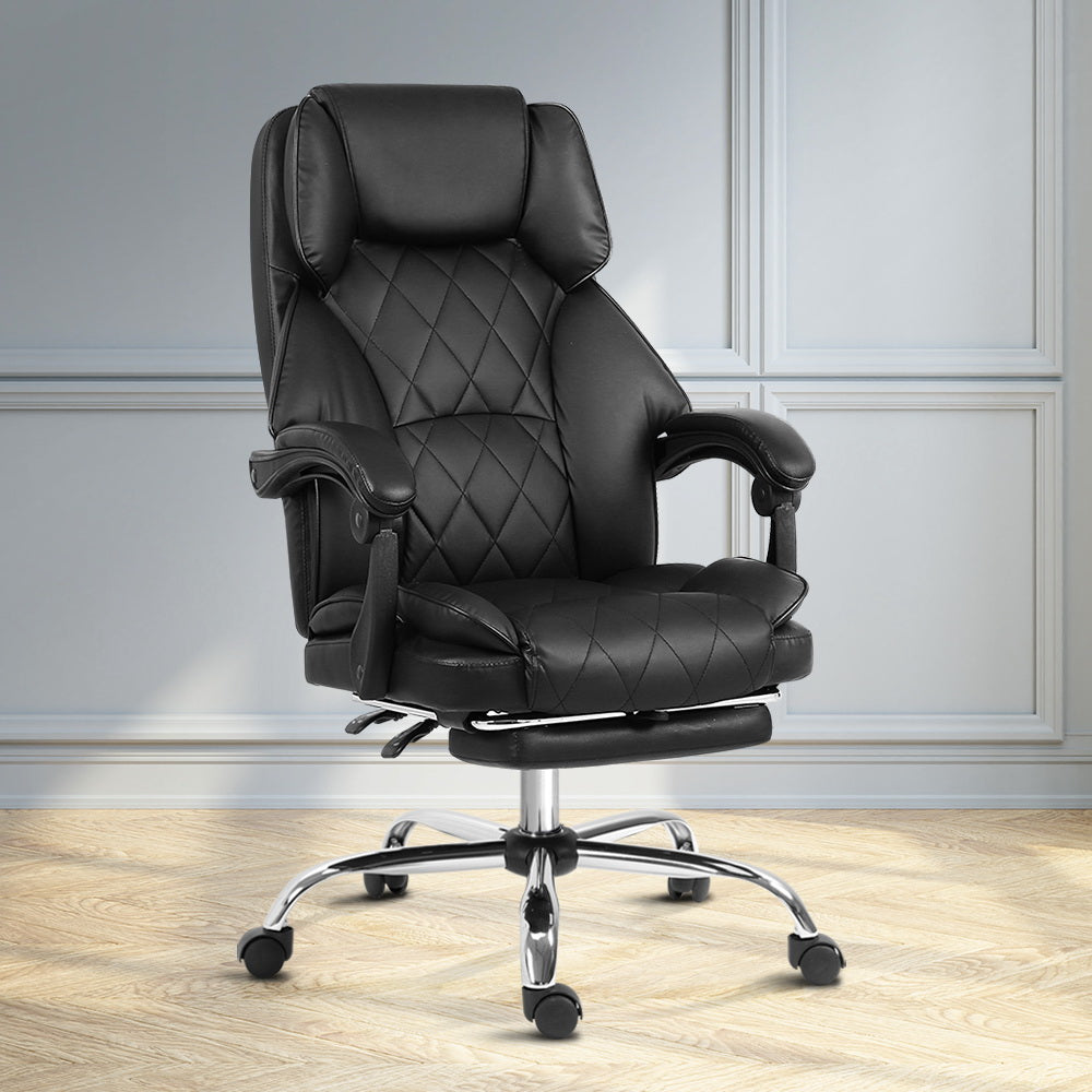 Fremantle black PU leather executive office chair with footrest in a home office
