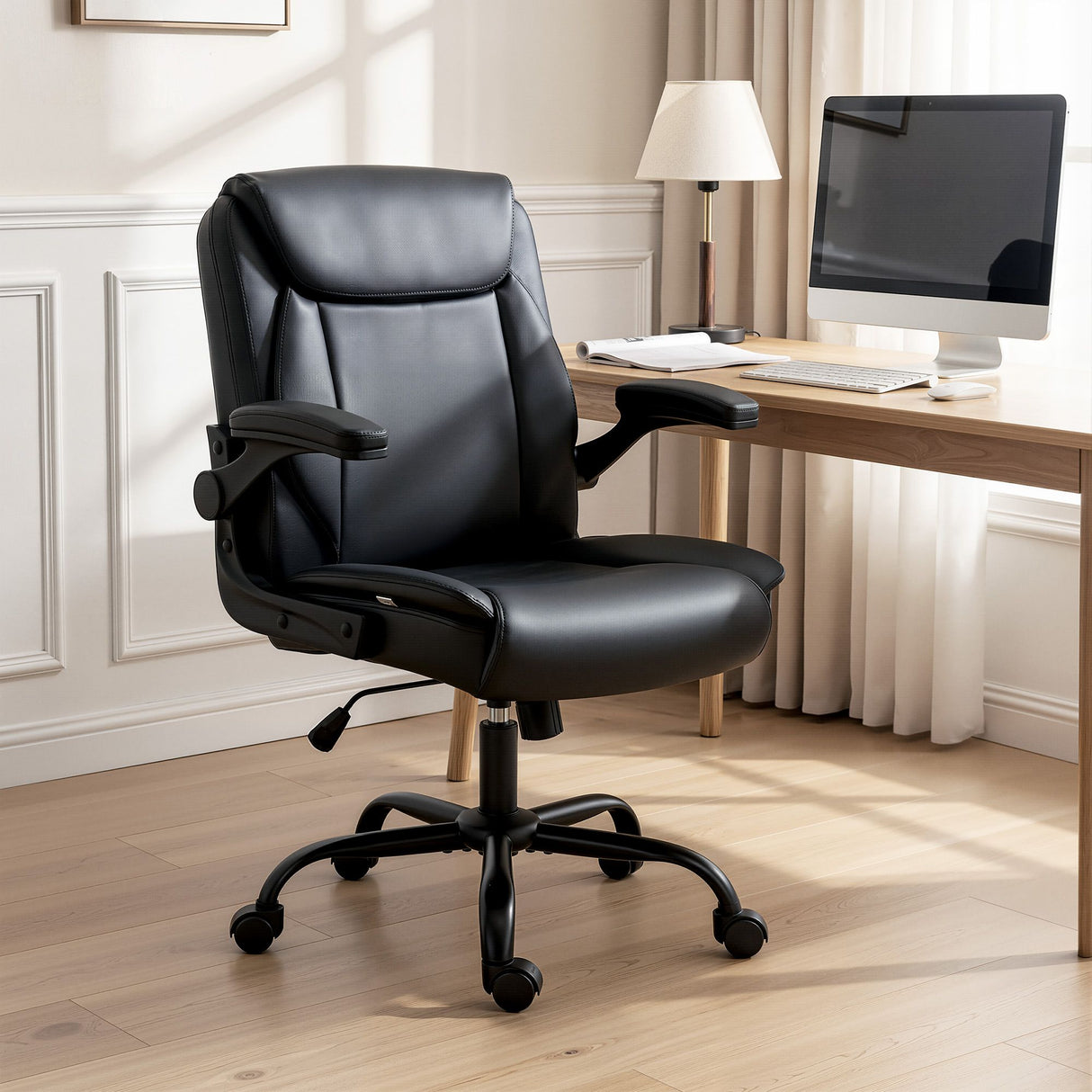 Toodyay black faux leather executive office chair with high back and metal base