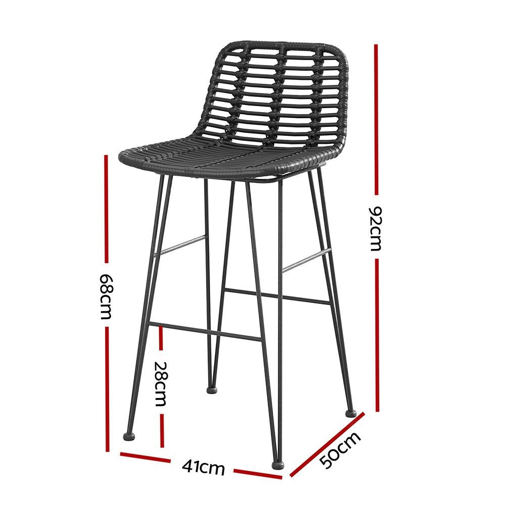 Rosebud West black outdoor wicker bar stool with steel frame on a patio