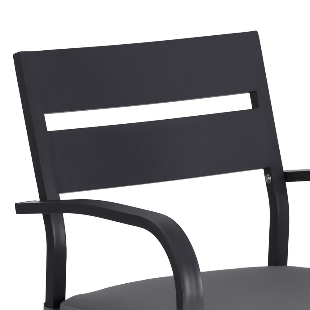 Bar stool showing slatted backrest and armrests
