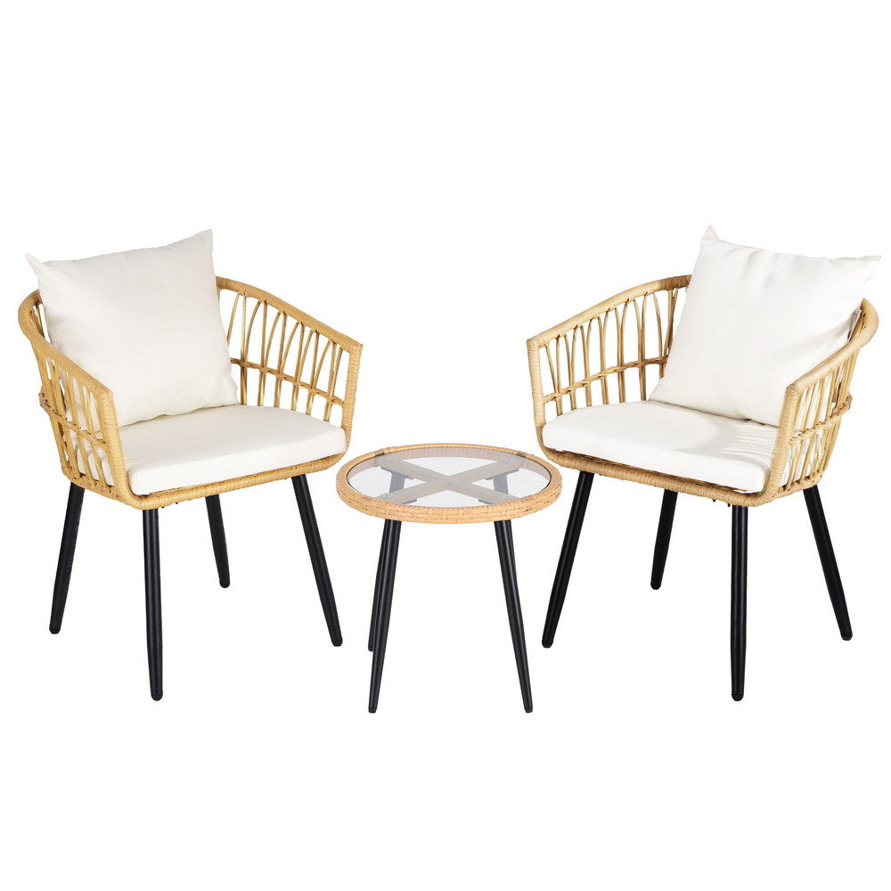 Carrara natural wicker outdoor lounge set in an outdoor setting