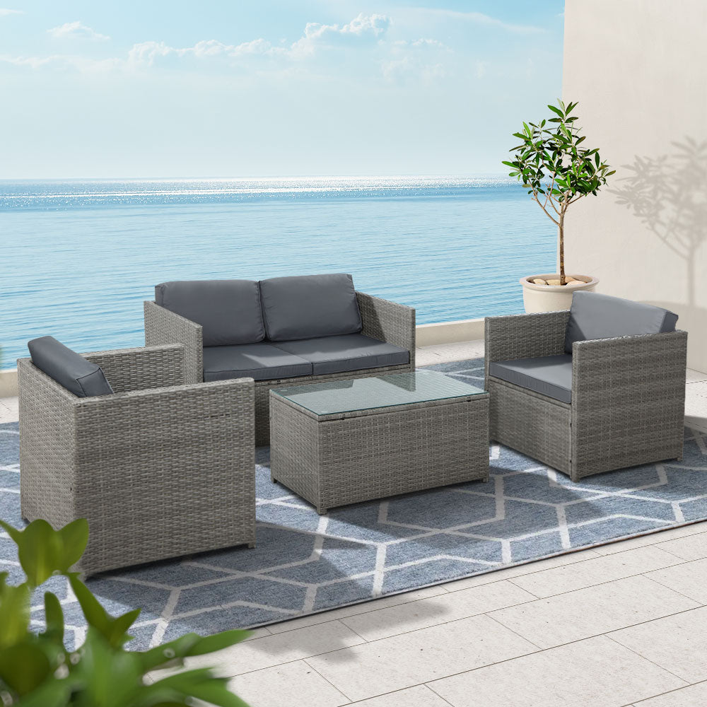 Currumbin grey wicker outdoor lounge set in an outdoor setting