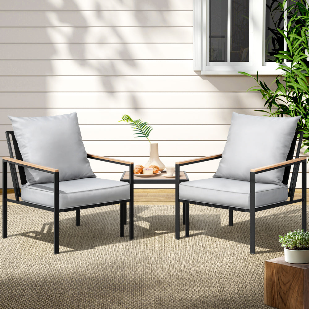 Coomera black steel outdoor lounge set in an outdoor setting