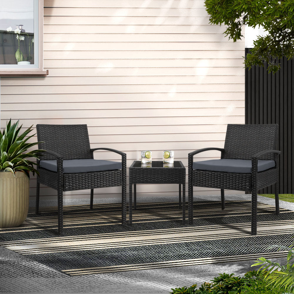 Tamborine black wicker outdoor lounge set in an outdoor setting