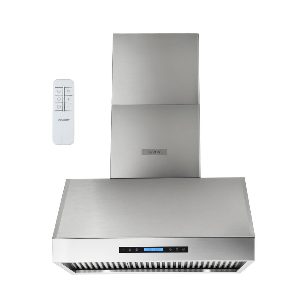 Stainless steel range hood shown at an angle with chimney extended