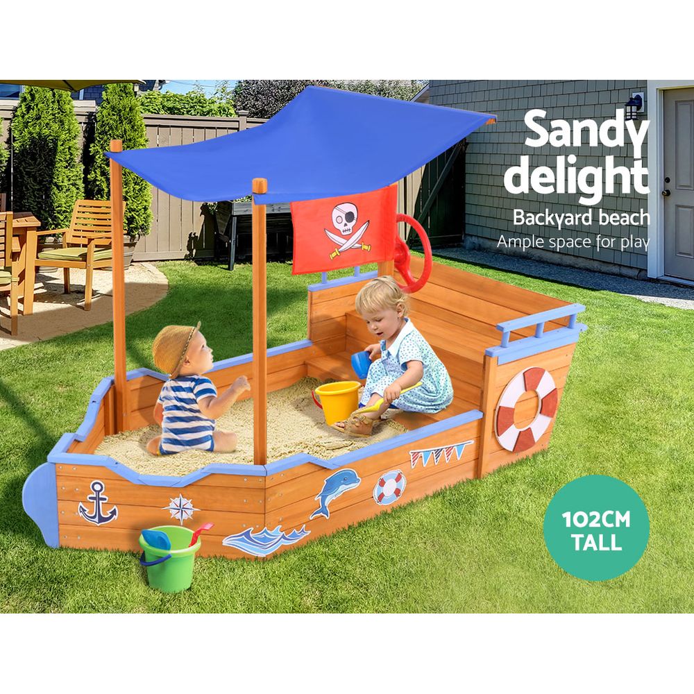 Wooden pirate boat sandpit with canopy and bench seats