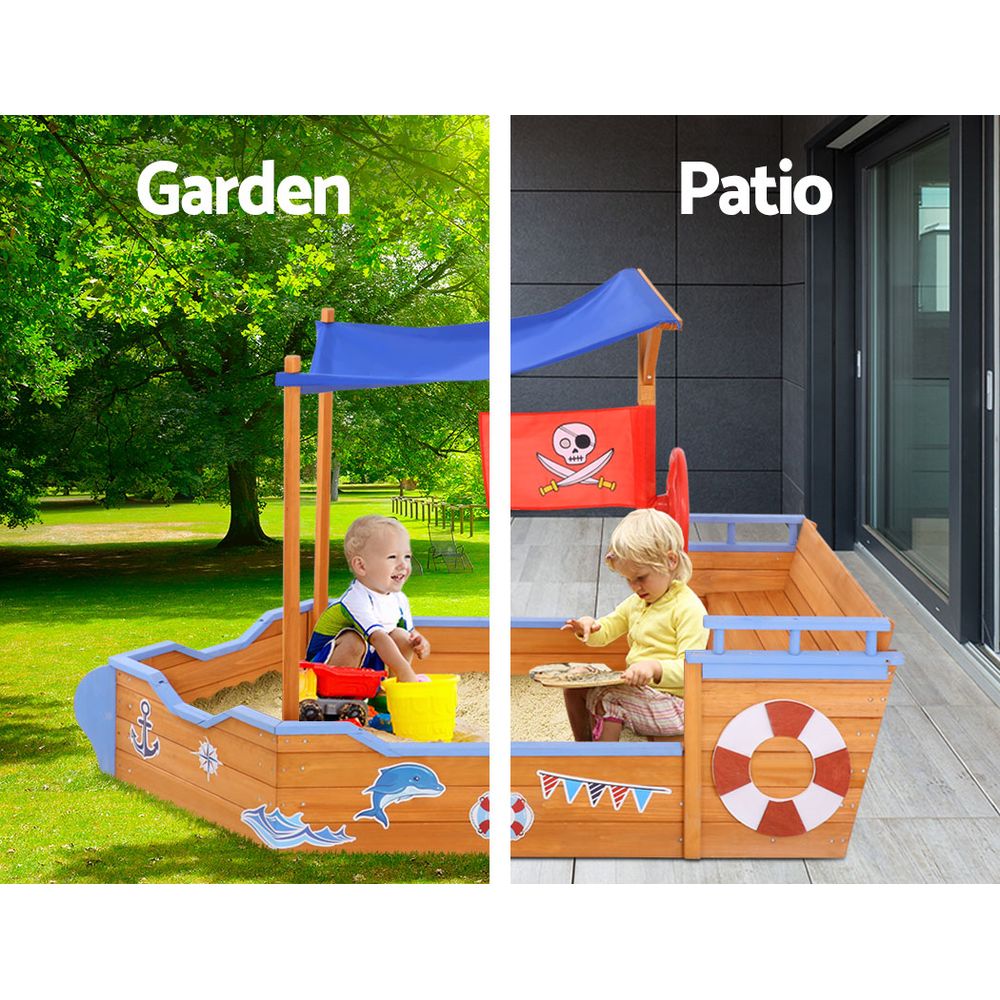 Wooden pirate boat sandpit with canopy and bench seats