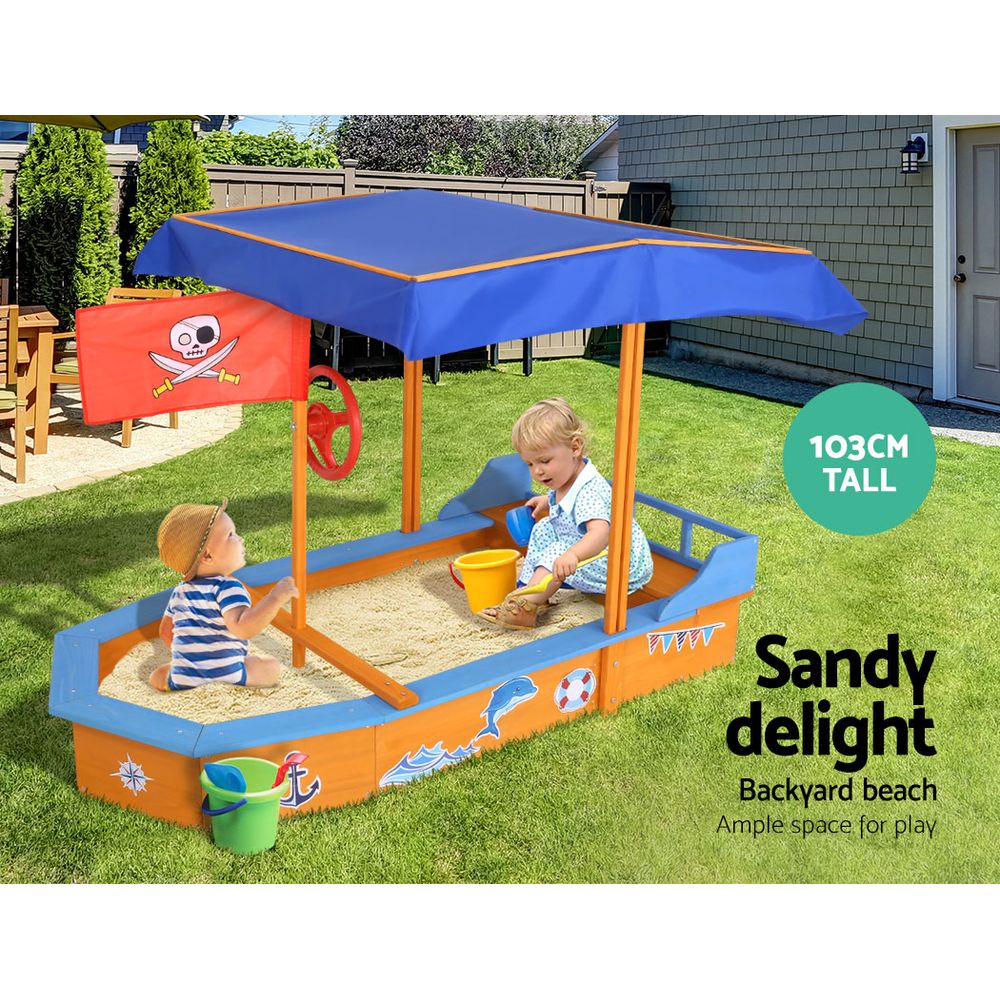 Wooden pirate boat sandpit with canopy and bench seats