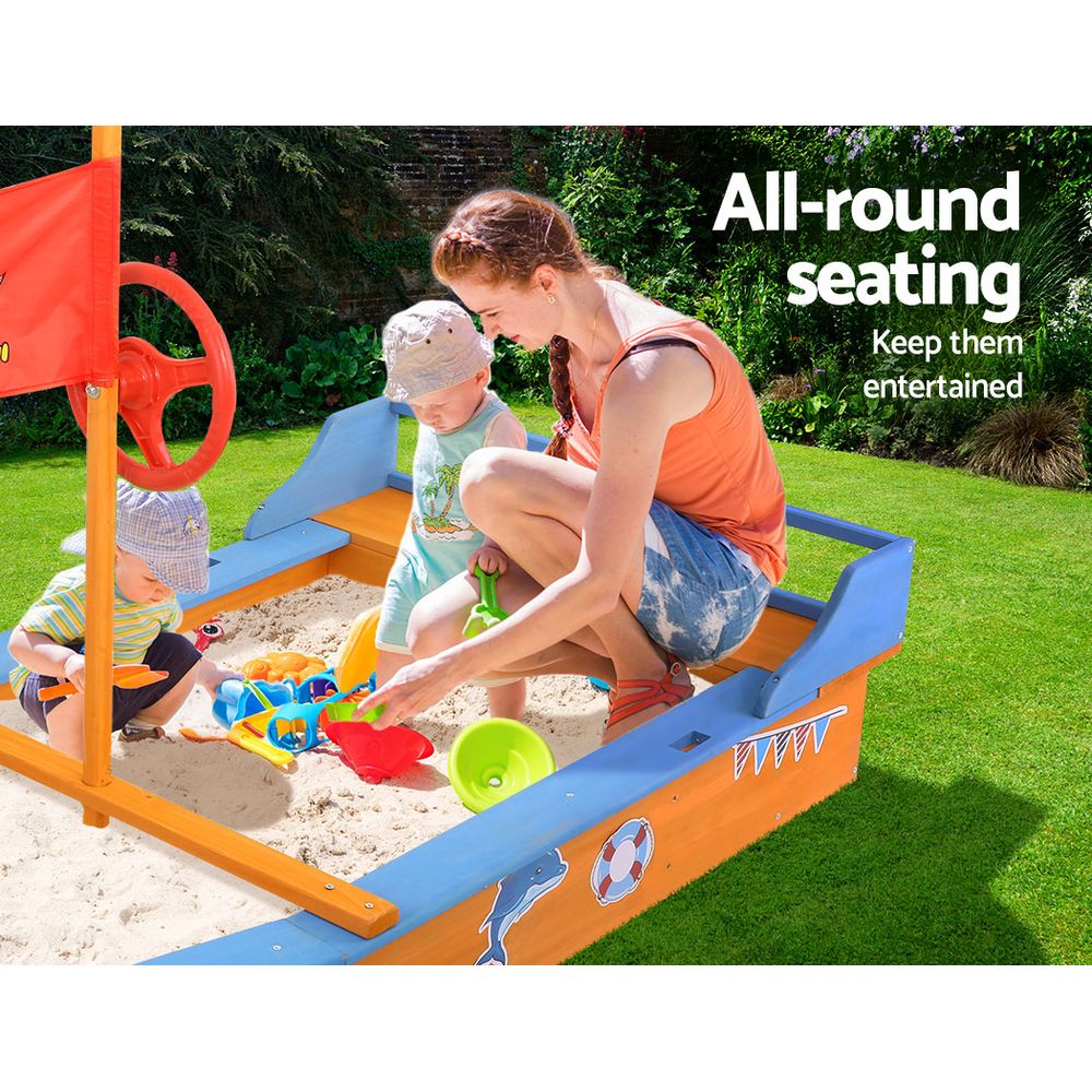 Wooden pirate boat sandpit with canopy and bench seats