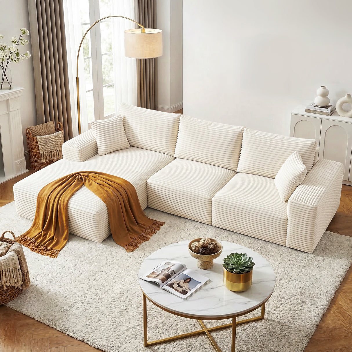 Tavernes white corduroy modular sofa in a modern living room