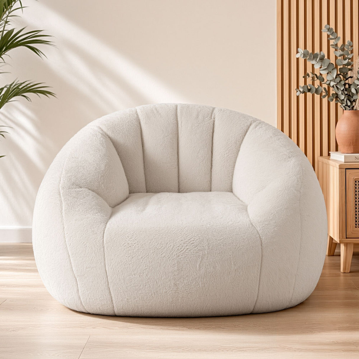 Garraf White faux fur bean bag sofa in a modern living room