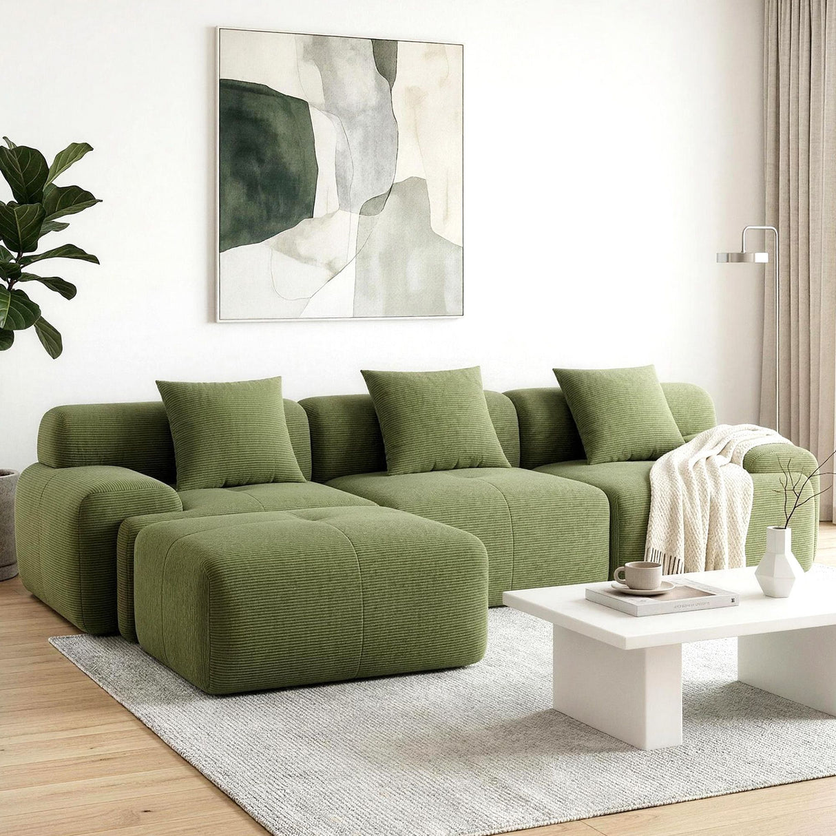 Tavernes green corduroy modular sofa in a modern living room