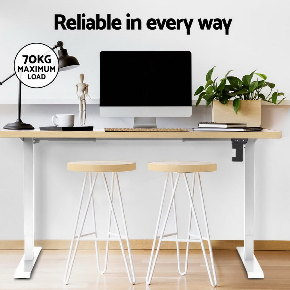 Kingston oak electric standing desk with walking pad in a home office