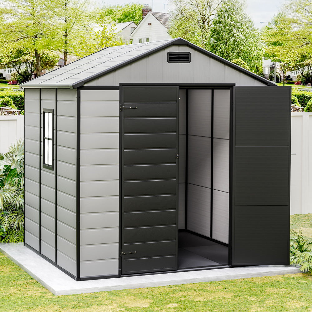 Grey resin garden shed in backyard setting