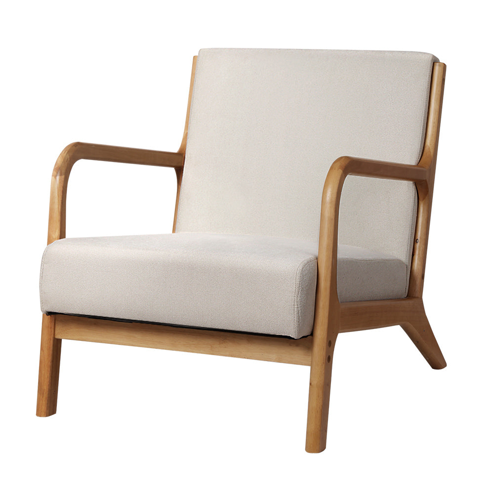 Springwood beige faux fabric armchair in a modern living room