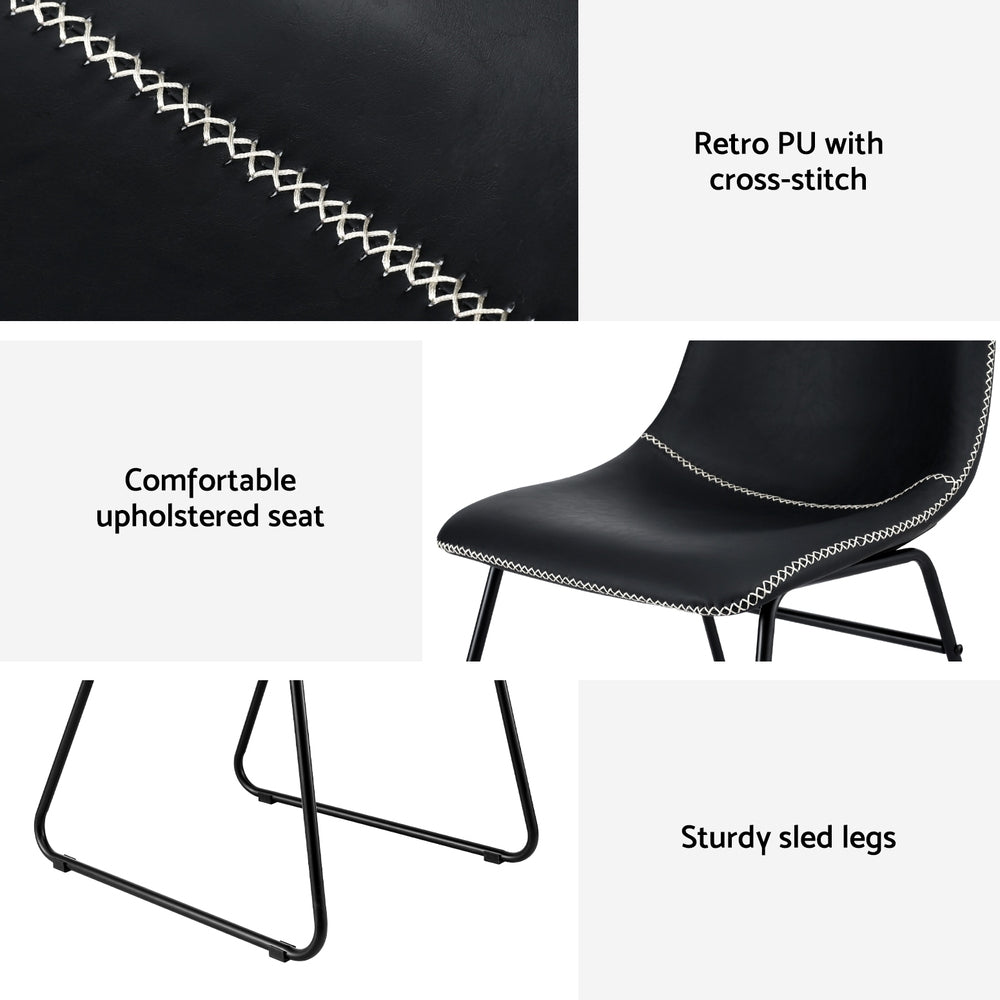 Daveyston black faux leather dining chair with metal sled legs
