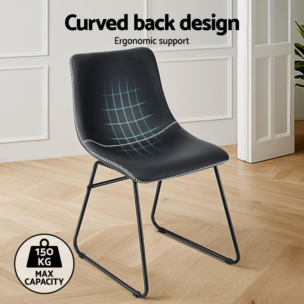 Daveyston black faux leather dining chair with metal sled legs