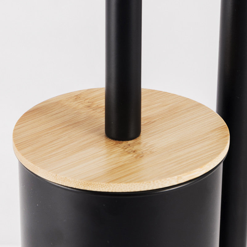 Side profile of the black iron freestanding toilet brush and paper holder