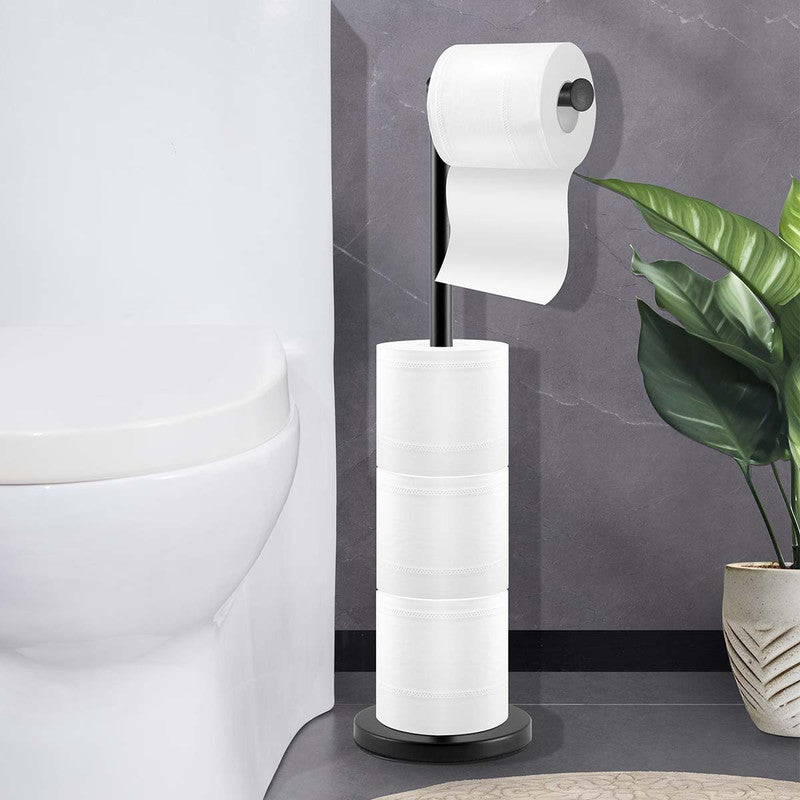 Black toilet roll stand beside a toilet holding a roll on the upper tier