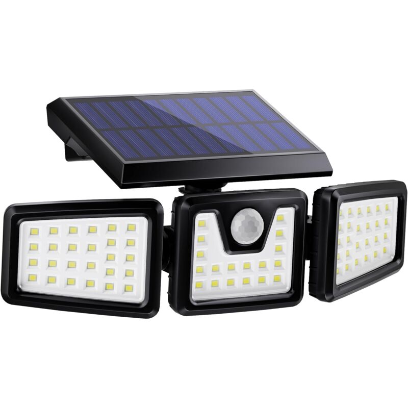Three head solar spotlight with motion sensor lighting a garden facade