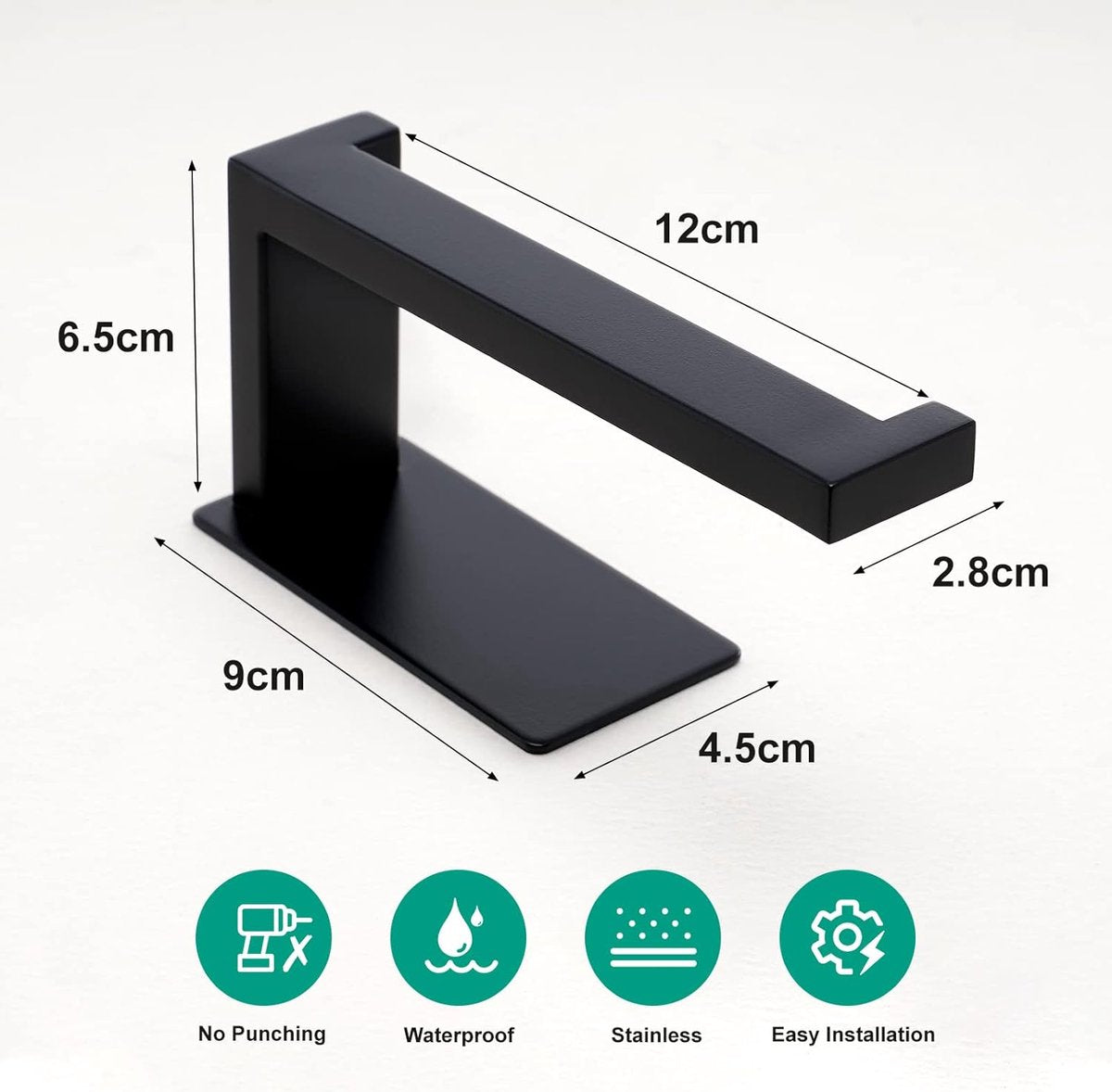 Black adhesive roll holder fixed to a tiled wall with no drilling