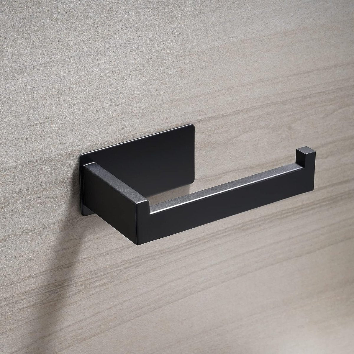 Roll holder shown with dimensions of 14 by 9 by 6.5 cm