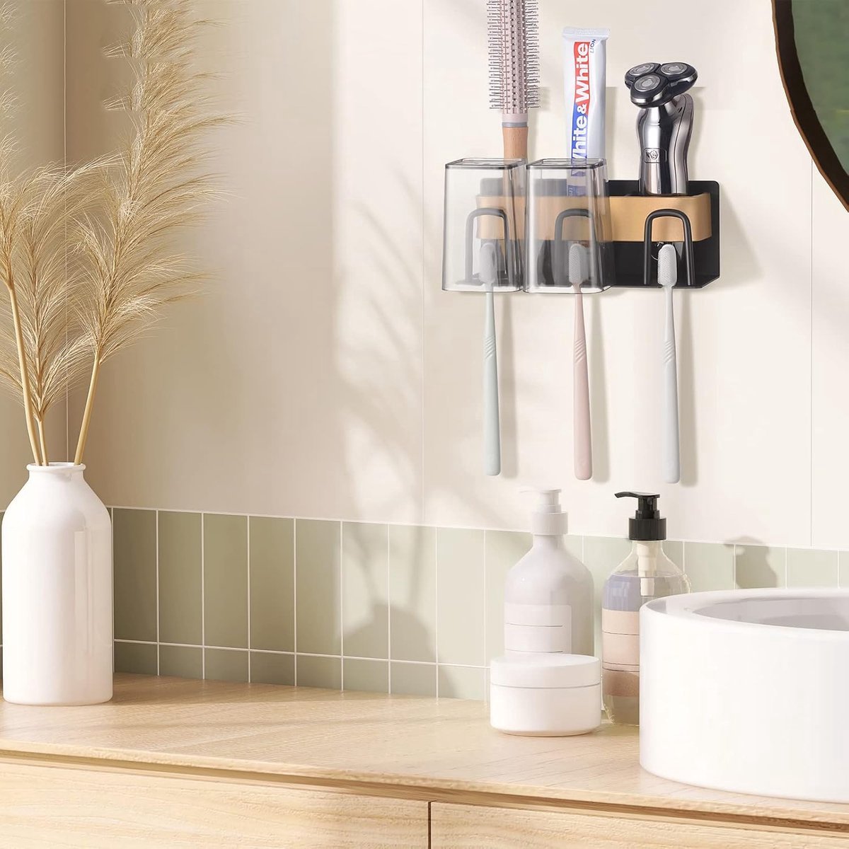 Adhesive mounting pad on the back of the stainless steel toothbrush holder
